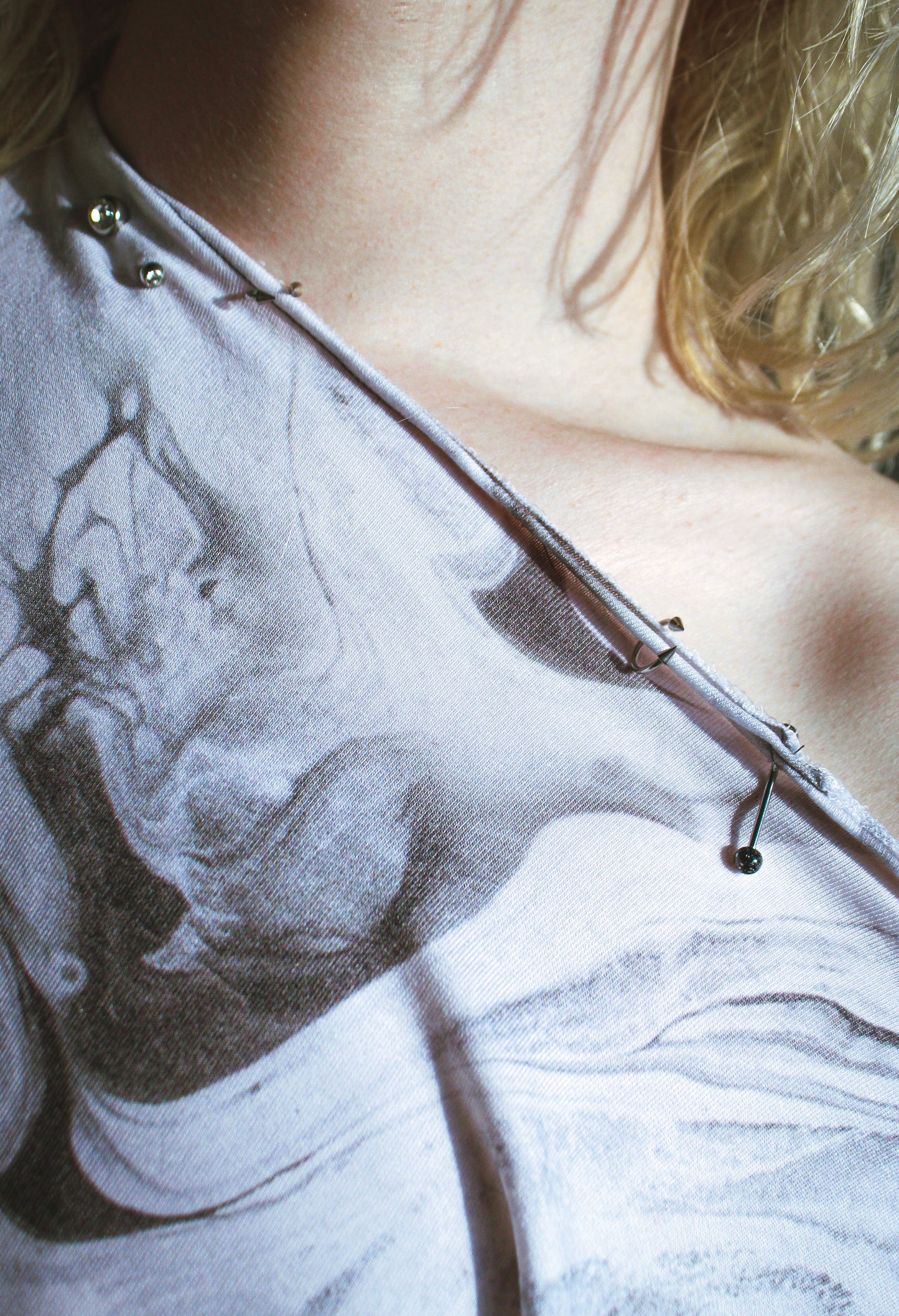 smoke grey piercing sleeveless top