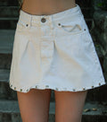 stud pleated white denim mini