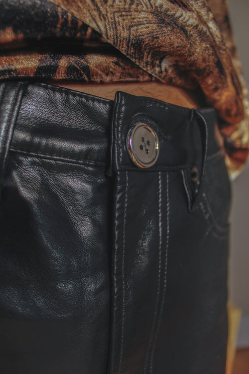 black faux-leather slim pants