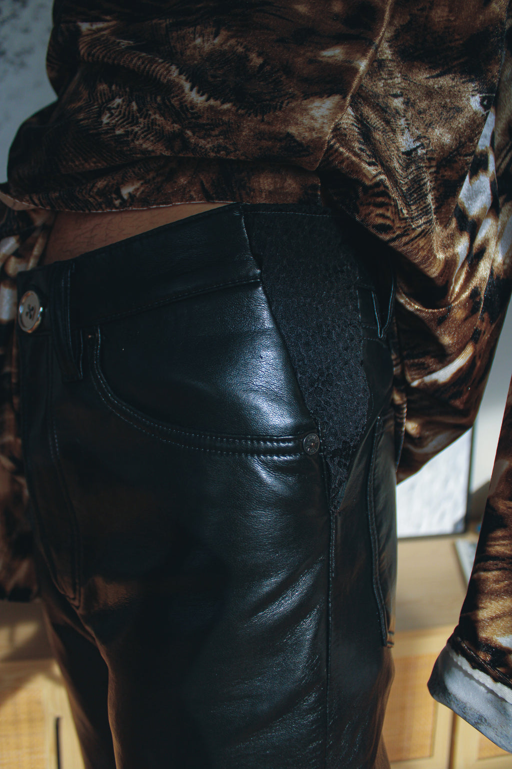 black faux-leather slim pants