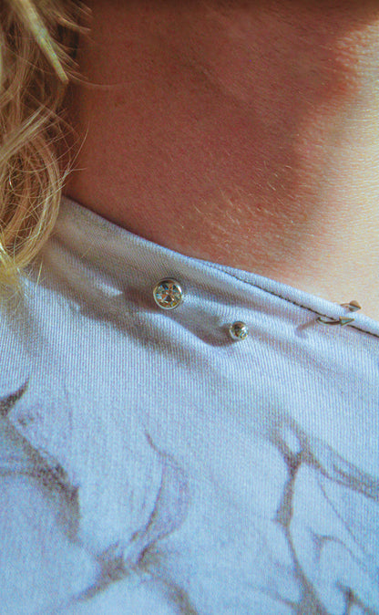 smoke grey piercing sleeveless top