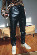black faux-leather slim pants